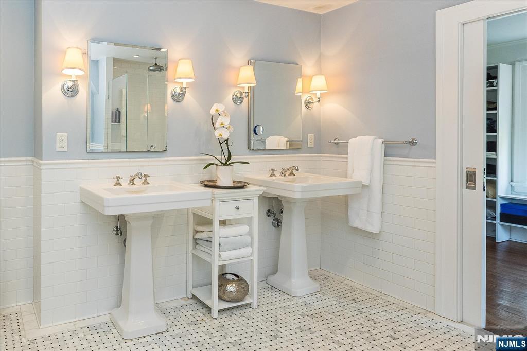 13 Ferncliff Terrace Glen Ridge, NJ 07028 - Photo 26 of 49 a bathroom with a sink and a mirror