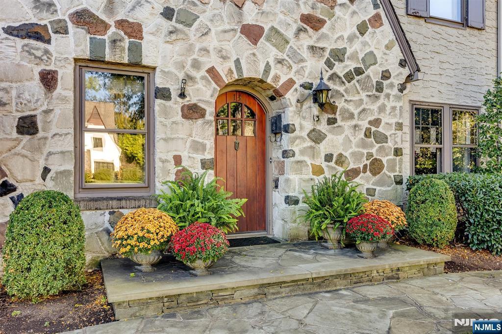 13 Ferncliff Terrace Glen Ridge, NJ 07028 - Photo 3 of 49 a view of a brick house with potted plants
