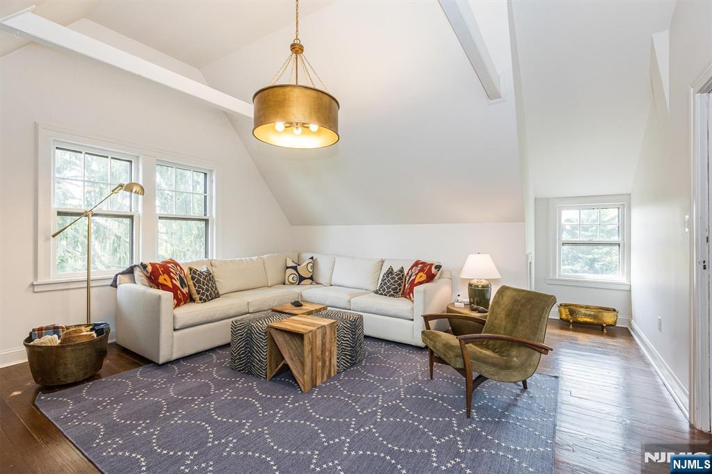 13 Ferncliff Terrace Glen Ridge, NJ 07028 - Photo 35 of 49 a living room with furniture chandelier and a large window