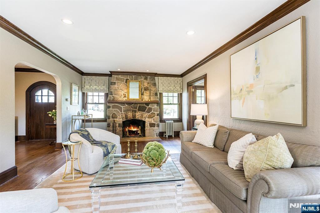 13 Ferncliff Terrace Glen Ridge, NJ 07028 - Photo 8 of 49 a living room with furniture and a fireplace