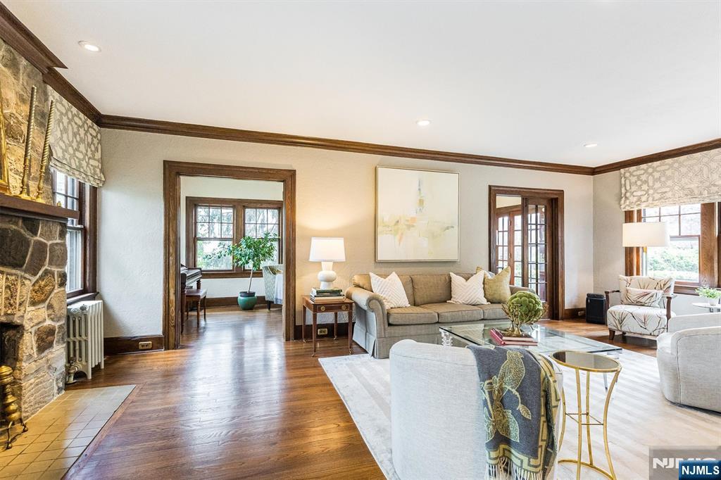 13 Ferncliff Terrace Glen Ridge, NJ 07028 - Photo 9 of 49 a living room with furniture and a large window