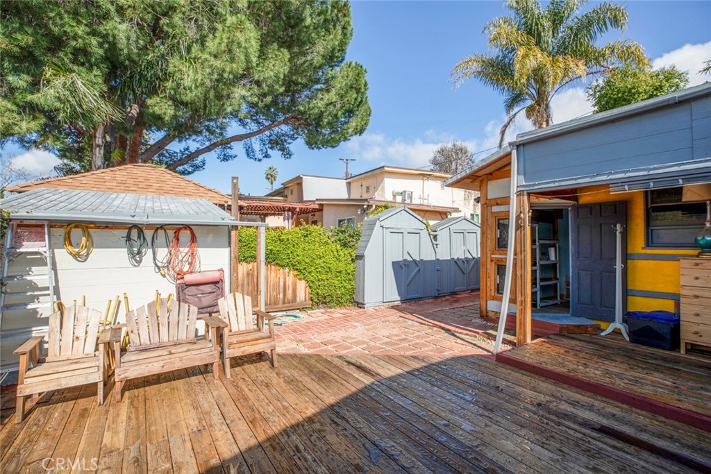 3704 3rd Avenue La Crescenta, CA 91214 - Photo 17 of 22 a view of a house with wooden floor and a table and chair