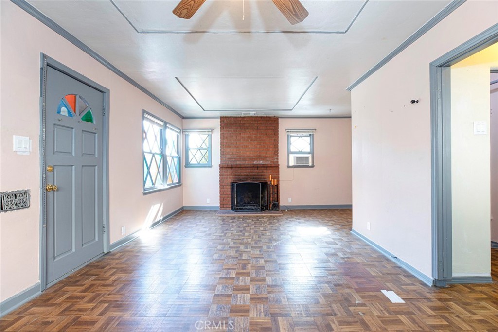 3704 3rd Avenue La Crescenta, CA 91214 - Photo 6 of 22 a view of a livingroom with a fireplace window and wooden floor