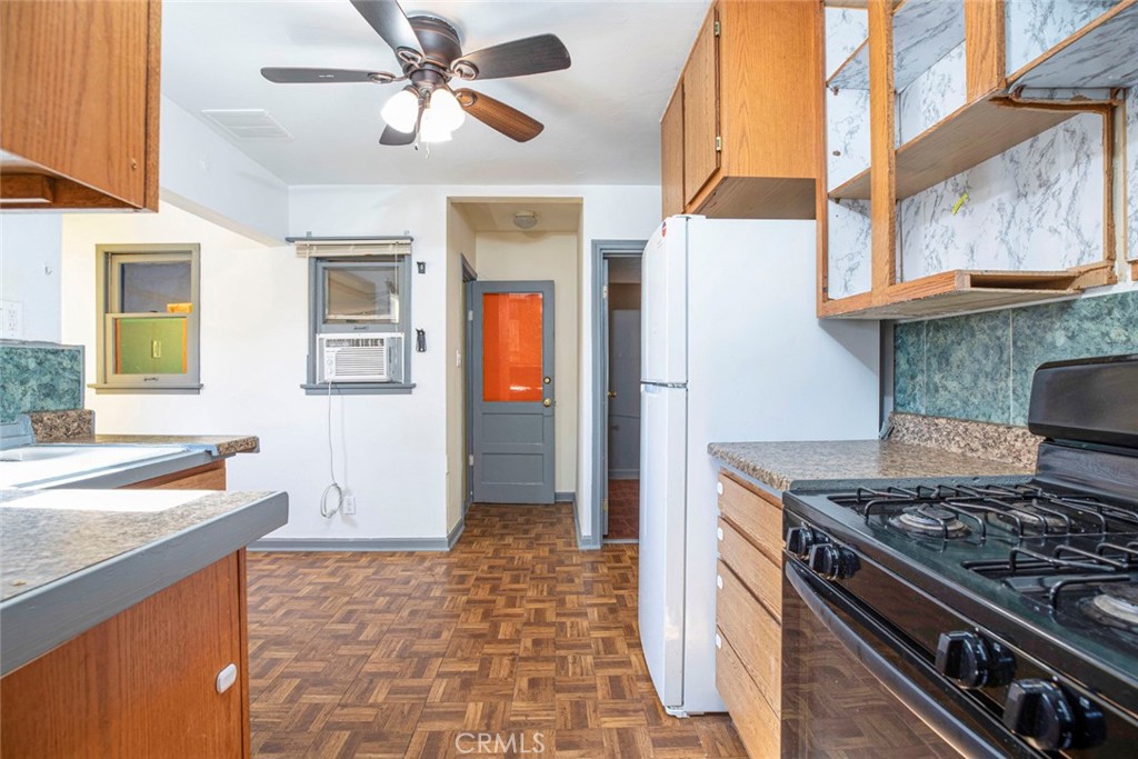 3704 3rd Avenue La Crescenta, CA 91214 - Photo 7 of 22 a kitchen with a stove and a sink