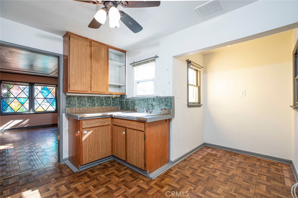 3704 3rd Avenue La Crescenta, CA 91214 - Photo 8 of 22 a kitchen that has a sink and a stove in it