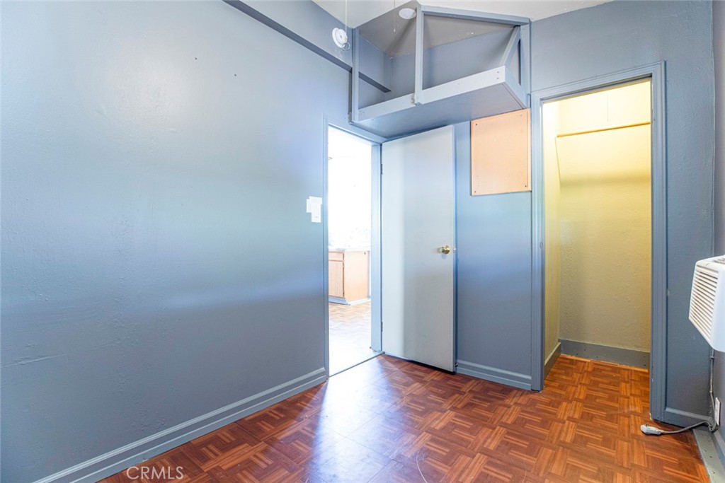 3704 3rd Avenue La Crescenta, CA 91214 - Photo 9 of 22 an empty room with wooden floor and windows