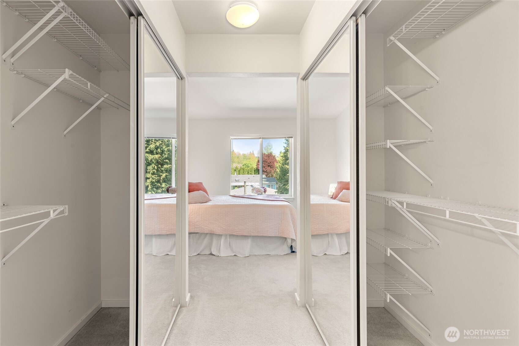 2009 196th Street Southeast, Unit E304 Bothell, WA 98012 - Photo 12 of 36 a view of an entryway with wooden floor and a rug