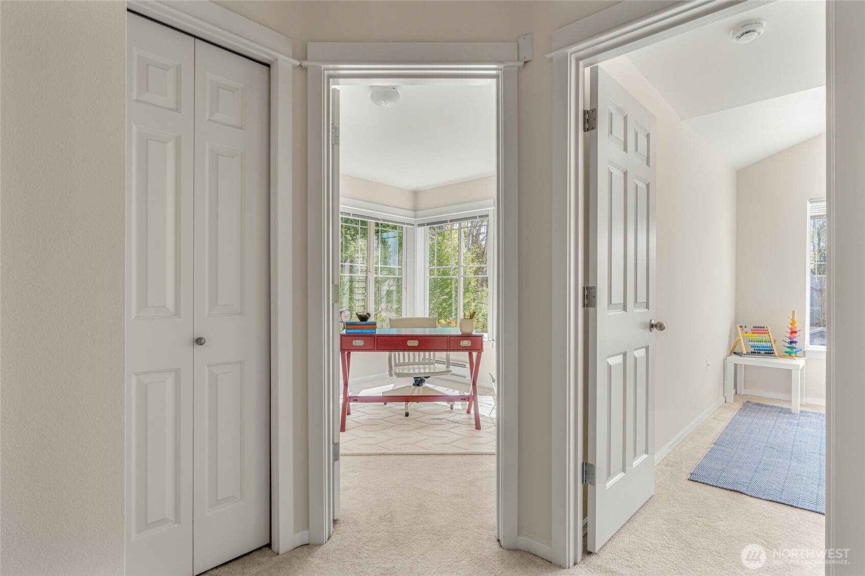 2009 196th Street Southeast, Unit E304 Bothell, WA 98012 - Photo 14 of 36 a view of a bathroom from the hallway with toilet