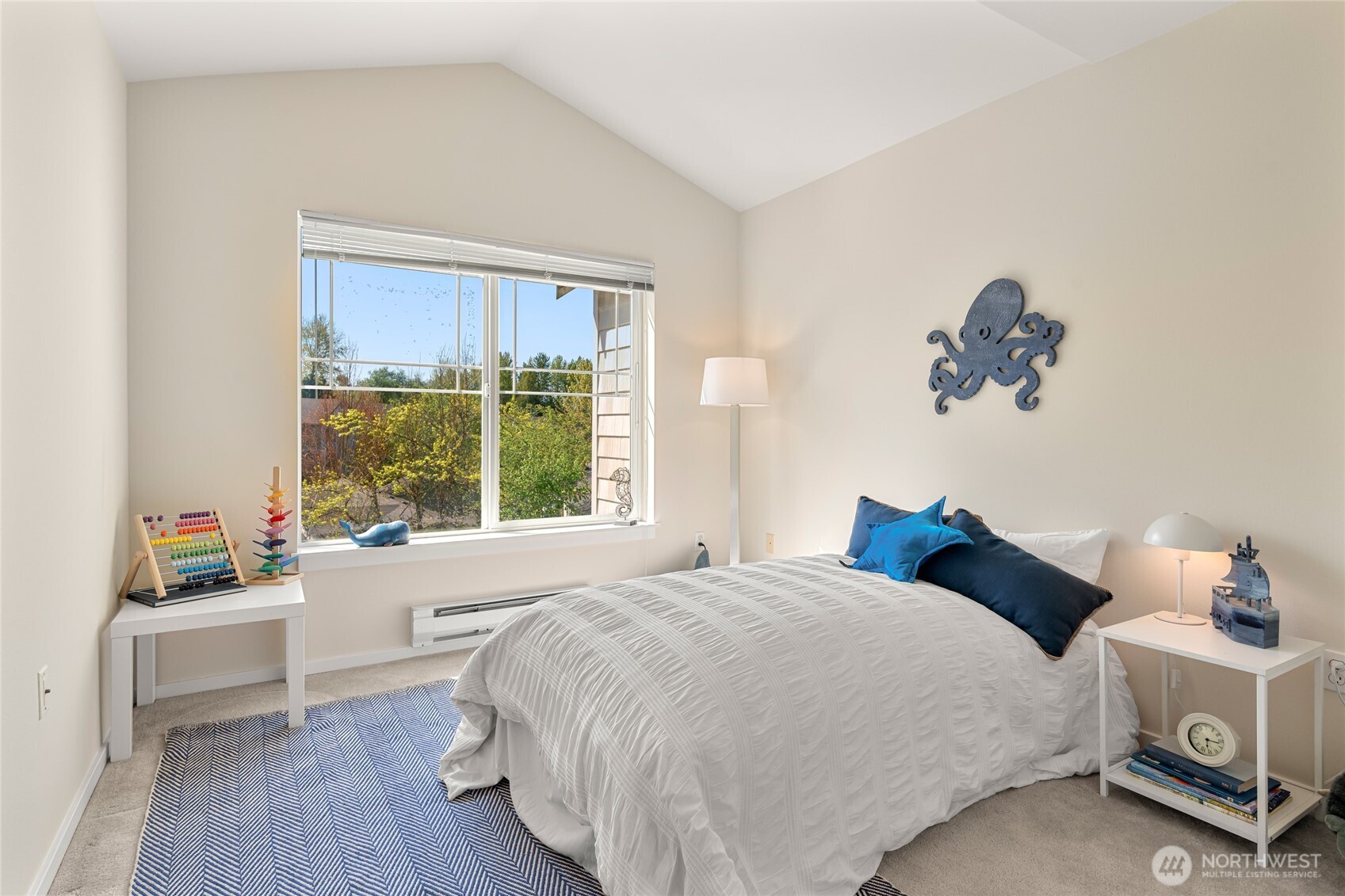 2009 196th Street Southeast, Unit E304 Bothell, WA 98012 - Photo 17 of 36 a bedroom with a bed and a window