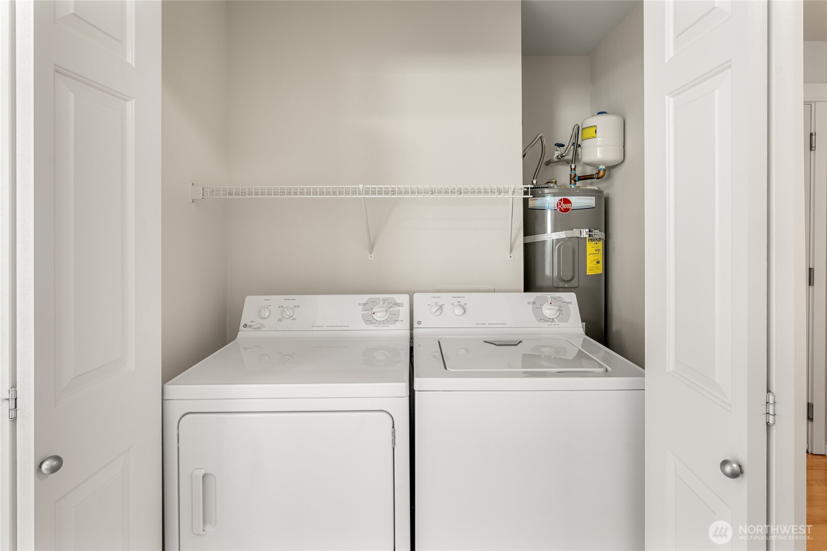 2009 196th Street Southeast, Unit E304 Bothell, WA 98012 - Photo 20 of 36 a utility room with dryer and washer
