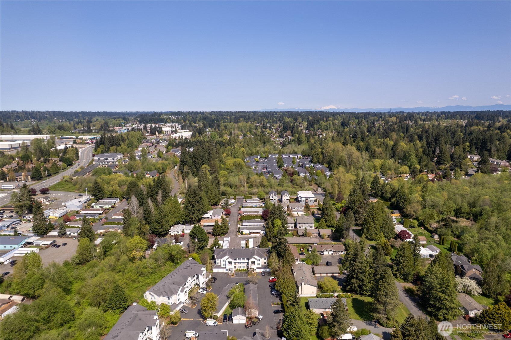 2009 196th Street Southeast, Unit E304 Bothell, WA 98012 - Photo 30 of 36 an aerial view of a city with lots of residential buildings