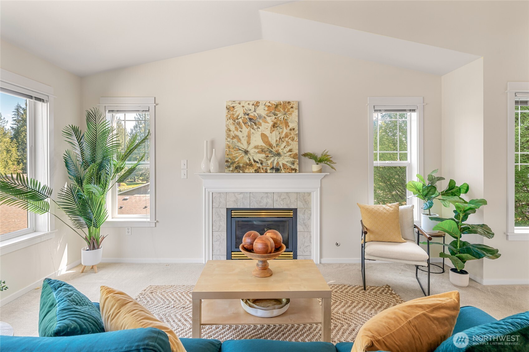 2009 196th Street Southeast, Unit E304 Bothell, WA 98012 - Photo 3 of 36 a living room with furniture and a fireplace