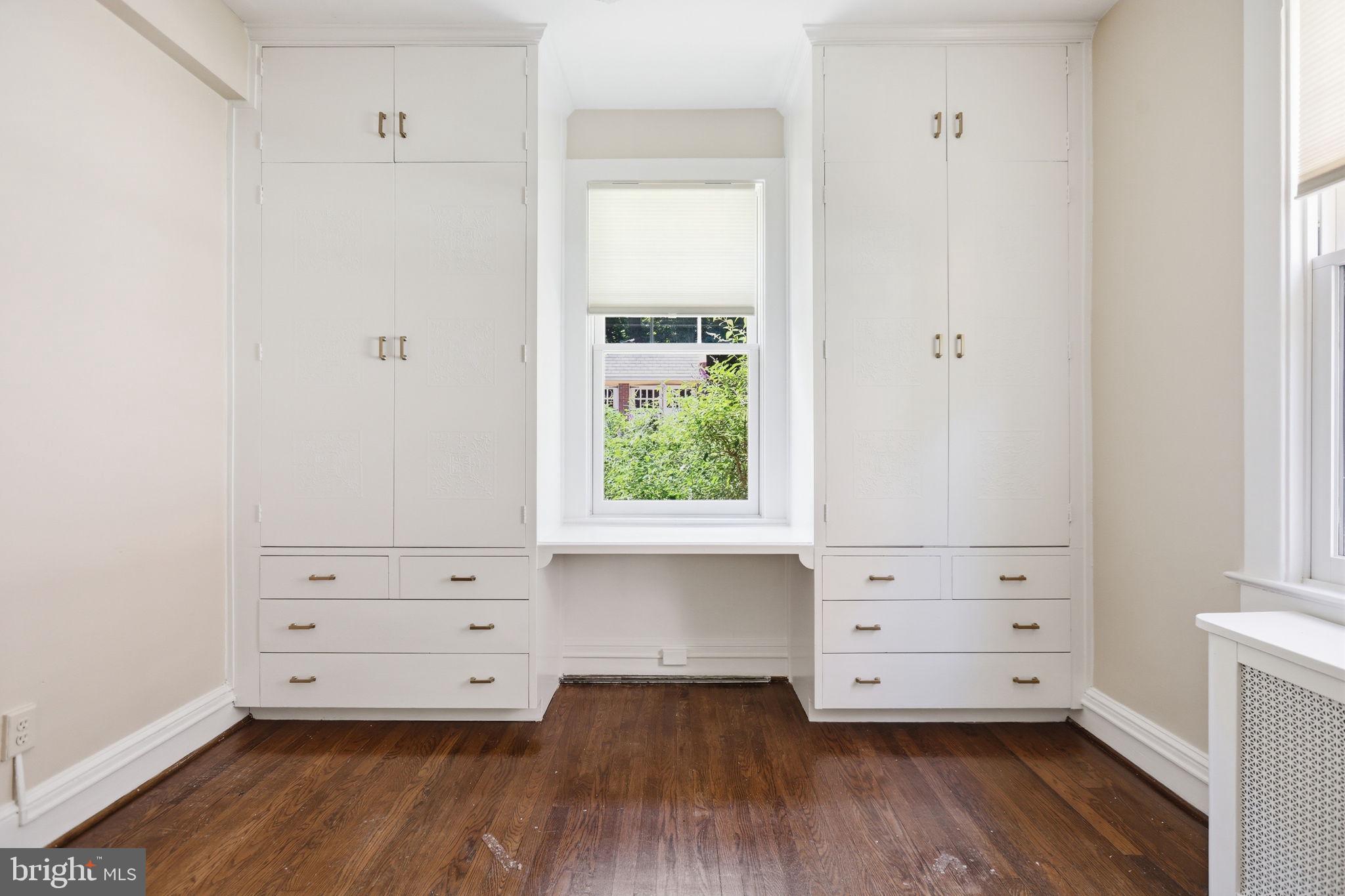 3018 Porter Street Northwest, Unit 103 Washington, DC 20008 - Photo 25 of 27 Bedroom with tons of built-in storage.
