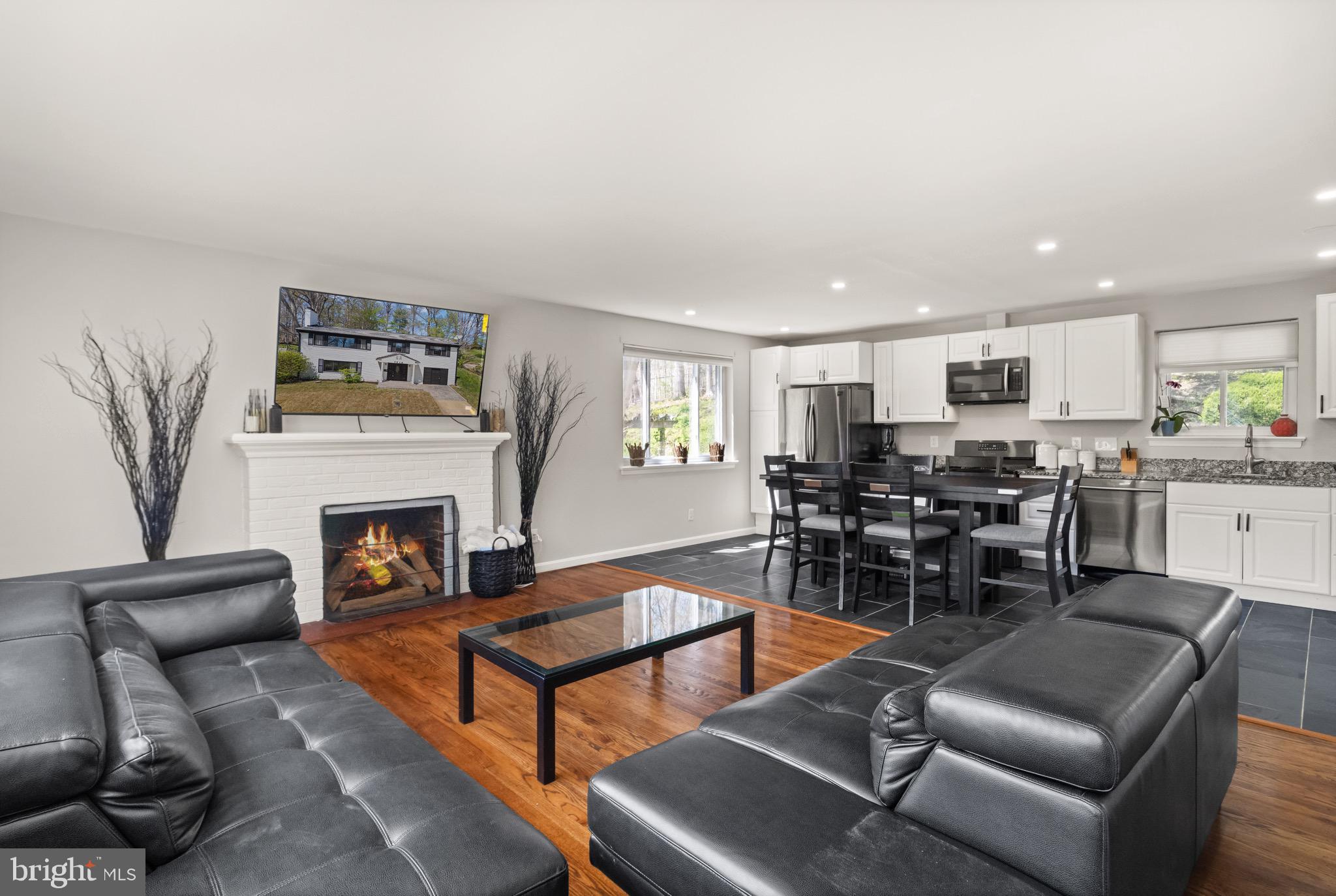 7516 Essex Avenue Springfield, VA 22150 - Photo 17 of 36 a living room with furniture or fireplace and a kitchen view