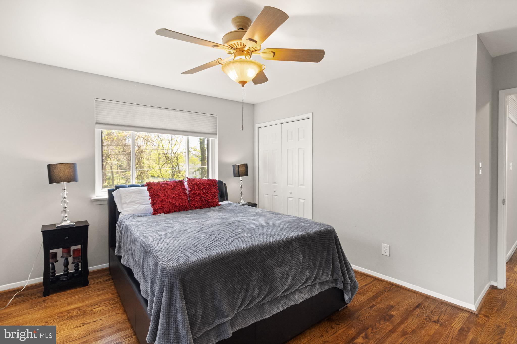 7516 Essex Avenue Springfield, VA 22150 - Photo 19 of 36 a bedroom with a bed and a window