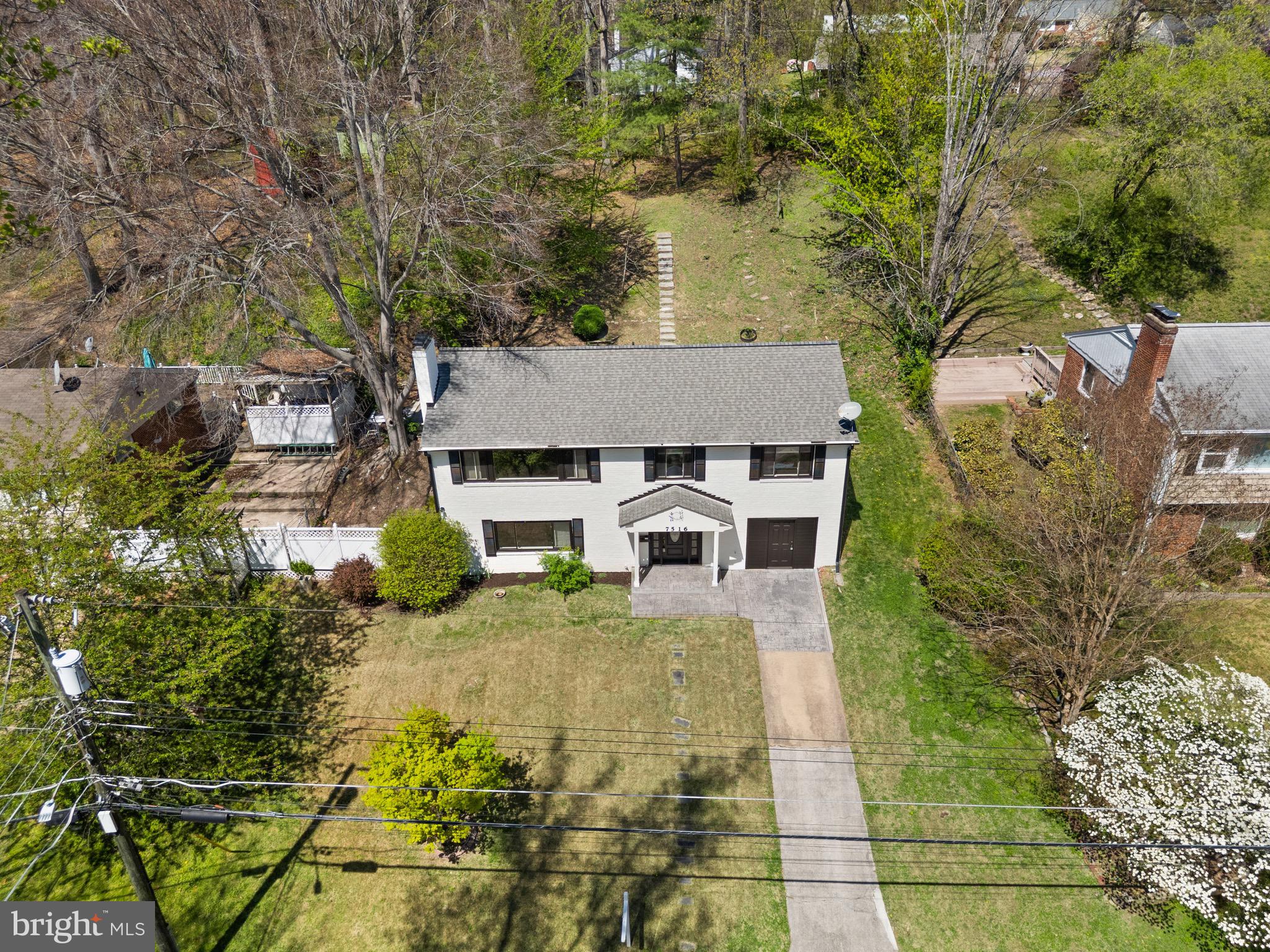 7516 Essex Avenue Springfield, VA 22150 - Photo 34 of 36 front view of a house with a yard