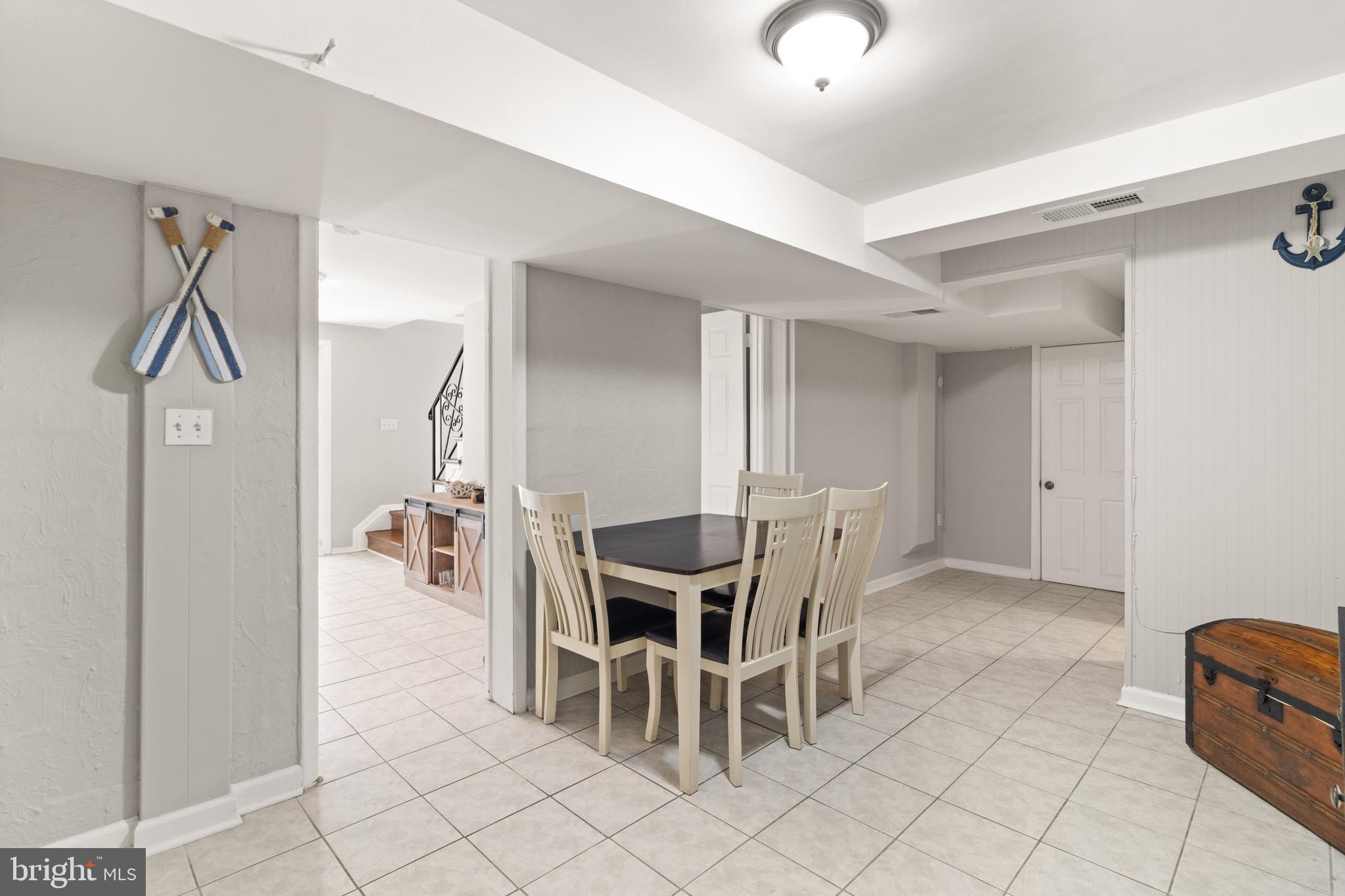 7516 Essex Avenue Springfield, VA 22150 - Photo 7 of 36 a view of a dining room with furniture