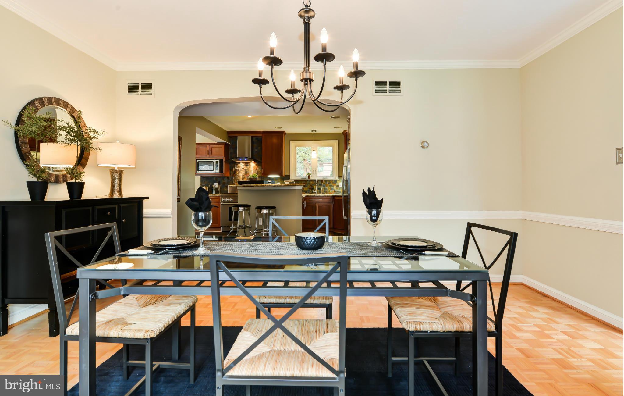 7303 Fort Hunt Road Alexandria, VA 22307 - Photo 6 of 30 a view of a dining room with furniture and chandelier