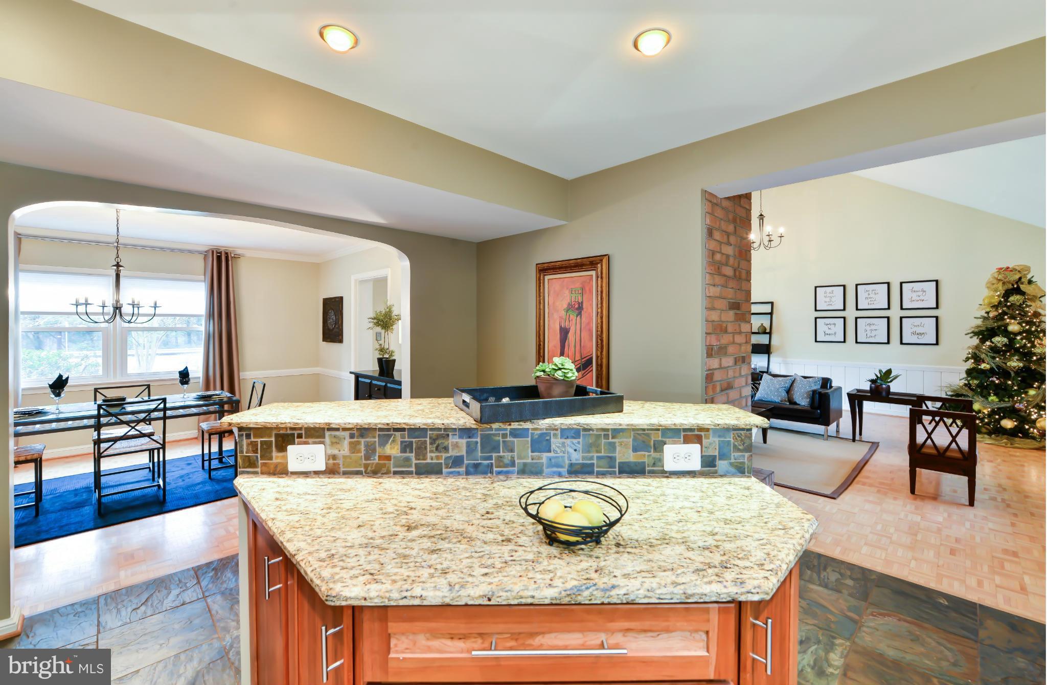 7303 Fort Hunt Road Alexandria, VA 22307 - Photo 10 of 30 a view of living room with granite countertop couches with wooden floor