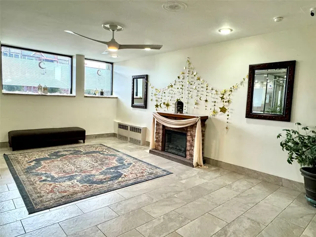 a living room with furniture and a table