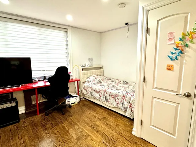 a view of a bedroom with workspace