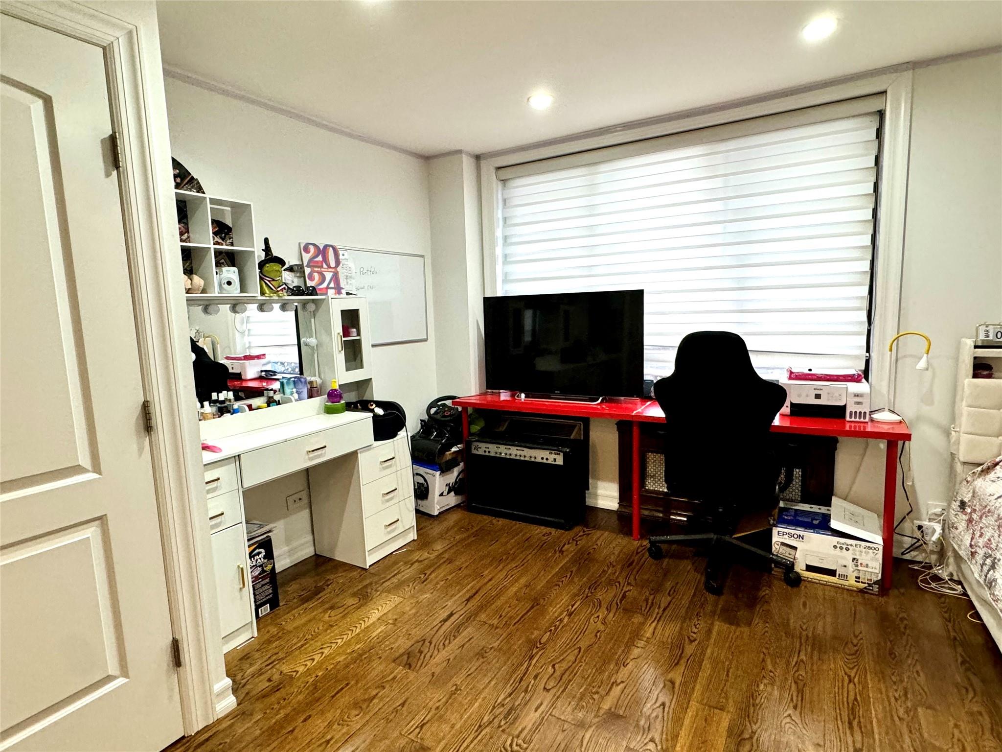 2121 Shore Parkway, Unit 4P Brooklyn, NY 11214 - Photo 10 of 20 a living room with furniture and a fireplace