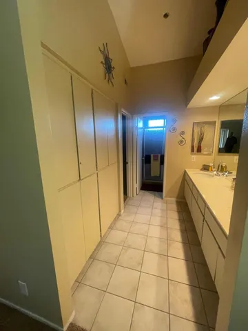 a bathroom with a sink and mirror