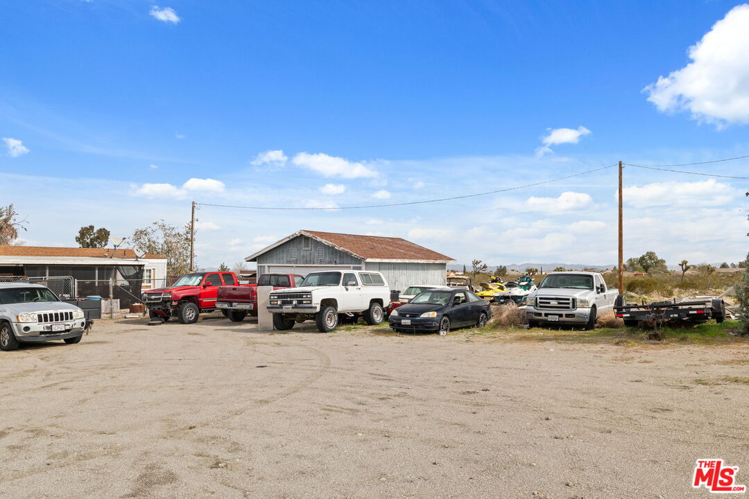 4120 La Mesa Road Phelan, CA 92371 - Photo 21 of 30 a view of a cars parked in front of a house