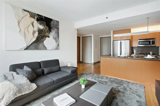 a living room with furniture and a couch