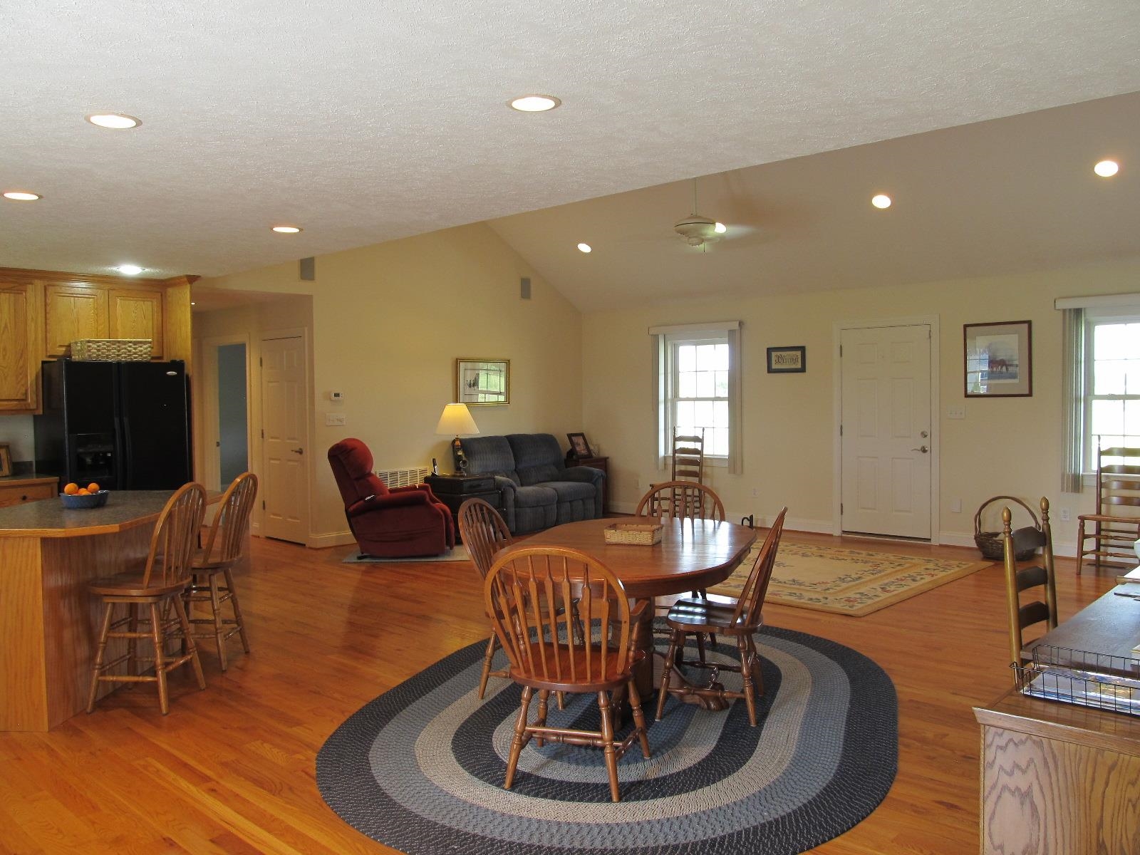 458 St James Road Fishersville, VA 22939 - Photo 12 of 61 a living room with furniture a dining table and a chandelier