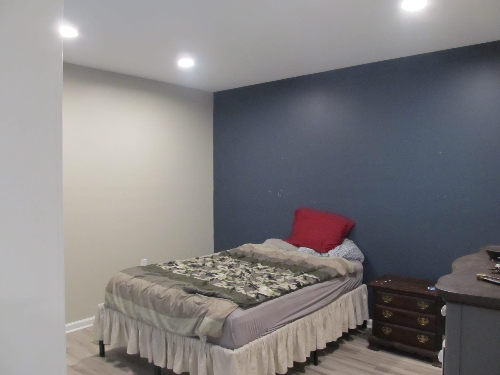 458 St James Road Fishersville, VA 22939 - Photo 29 of 61 a bedroom with a bed and a lamp