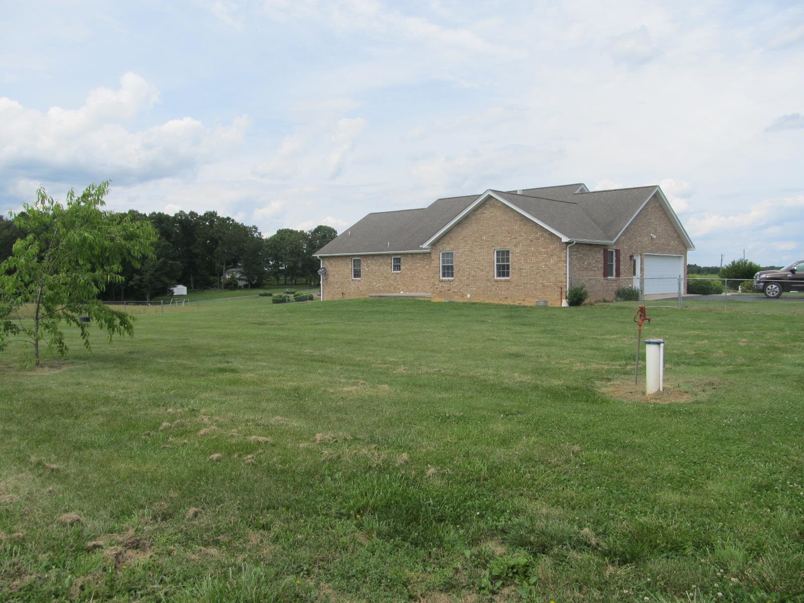 458 St James Road Fishersville, VA 22939 - Photo 50 of 61 a front view of a house with a yard and trees
