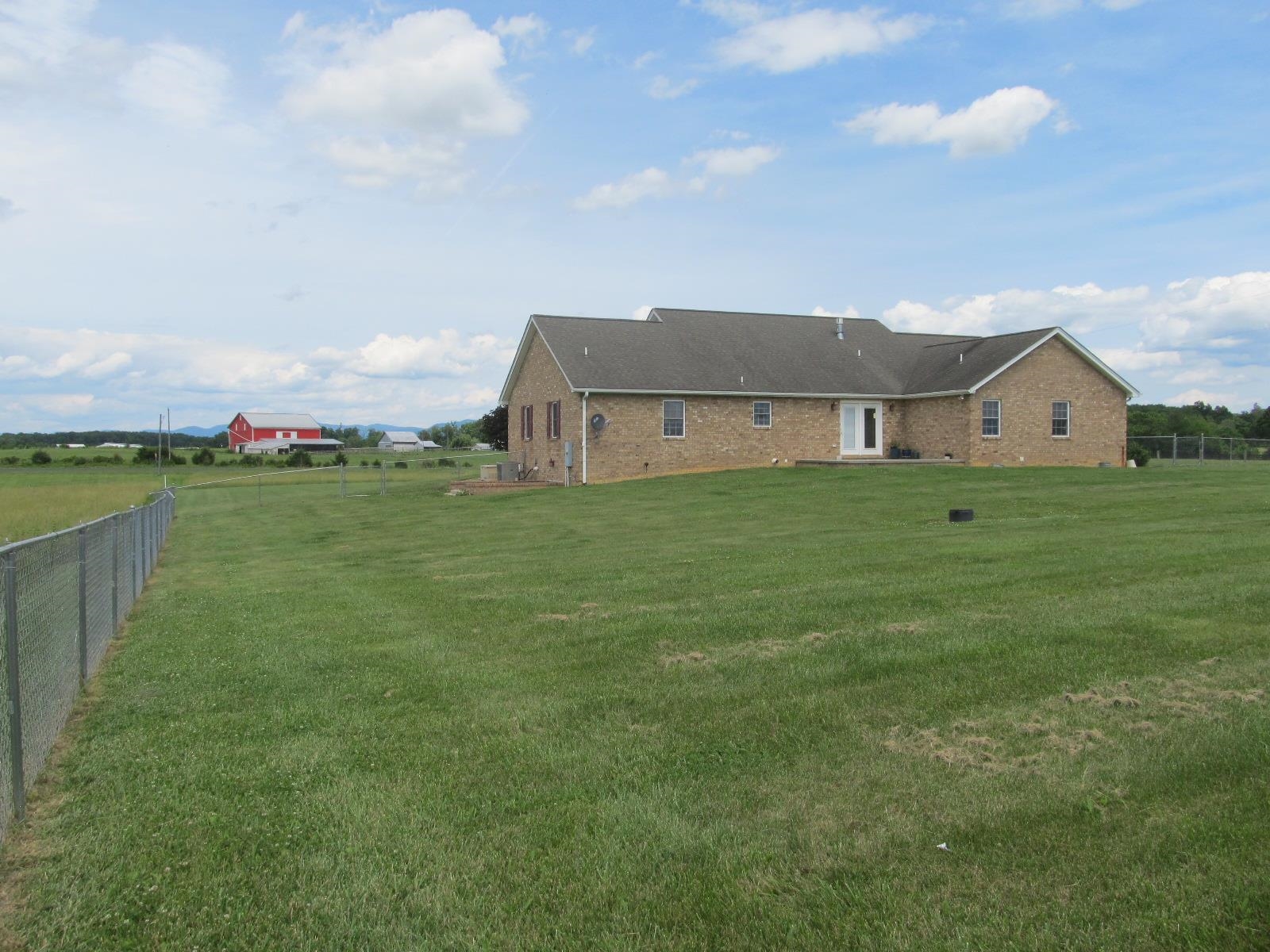 458 St James Road Fishersville, VA 22939 - Photo 51 of 61 a view of a big house with a big yard and a large tree