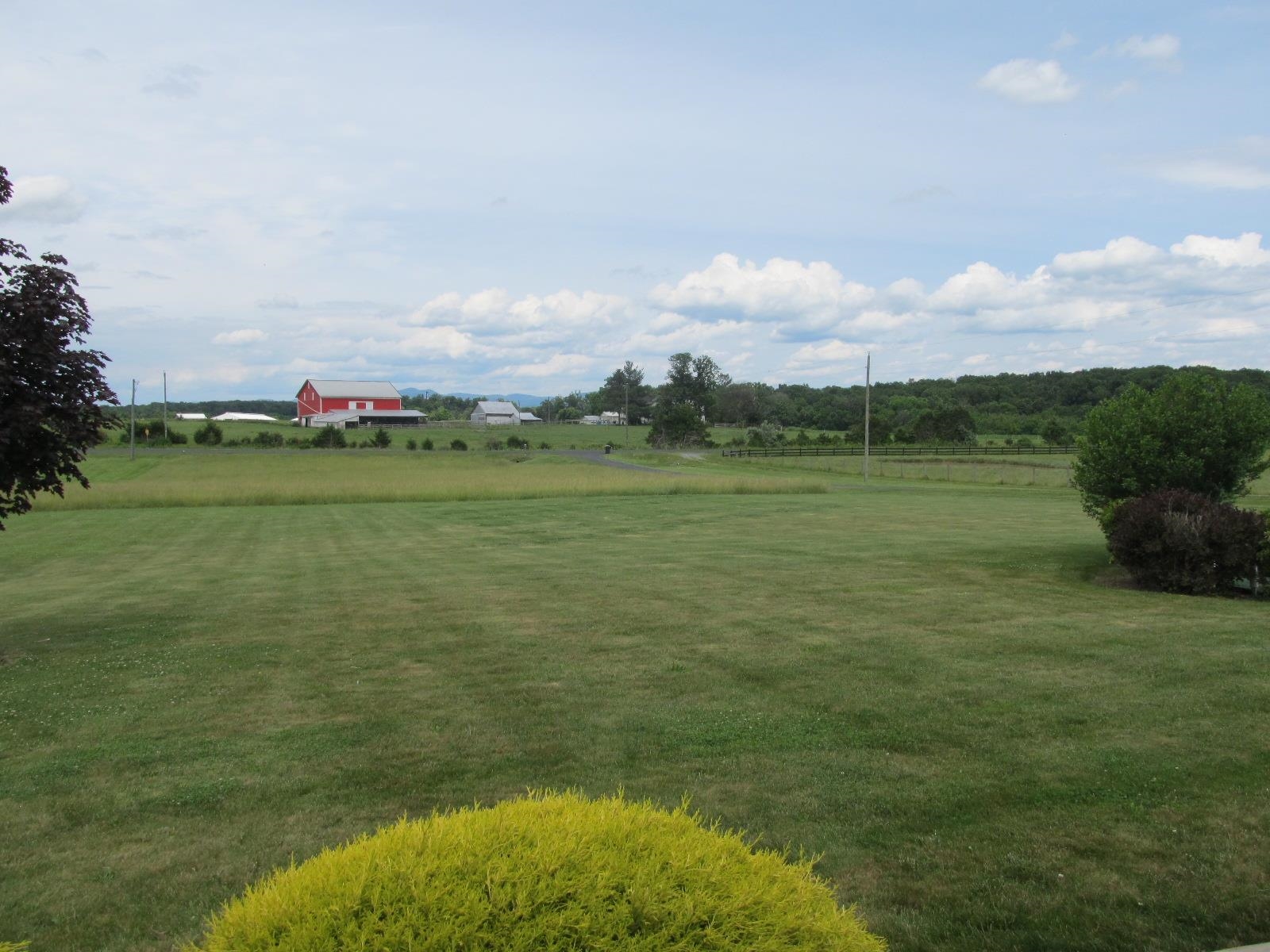 458 St James Road Fishersville, VA 22939 - Photo 54 of 61 a view of a lake with houses in the back