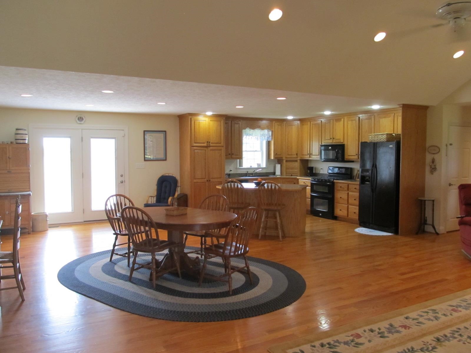 458 St James Road Fishersville, VA 22939 - Photo 7 of 61 a living room with stainless steel appliances furniture a dining table and kitchen view