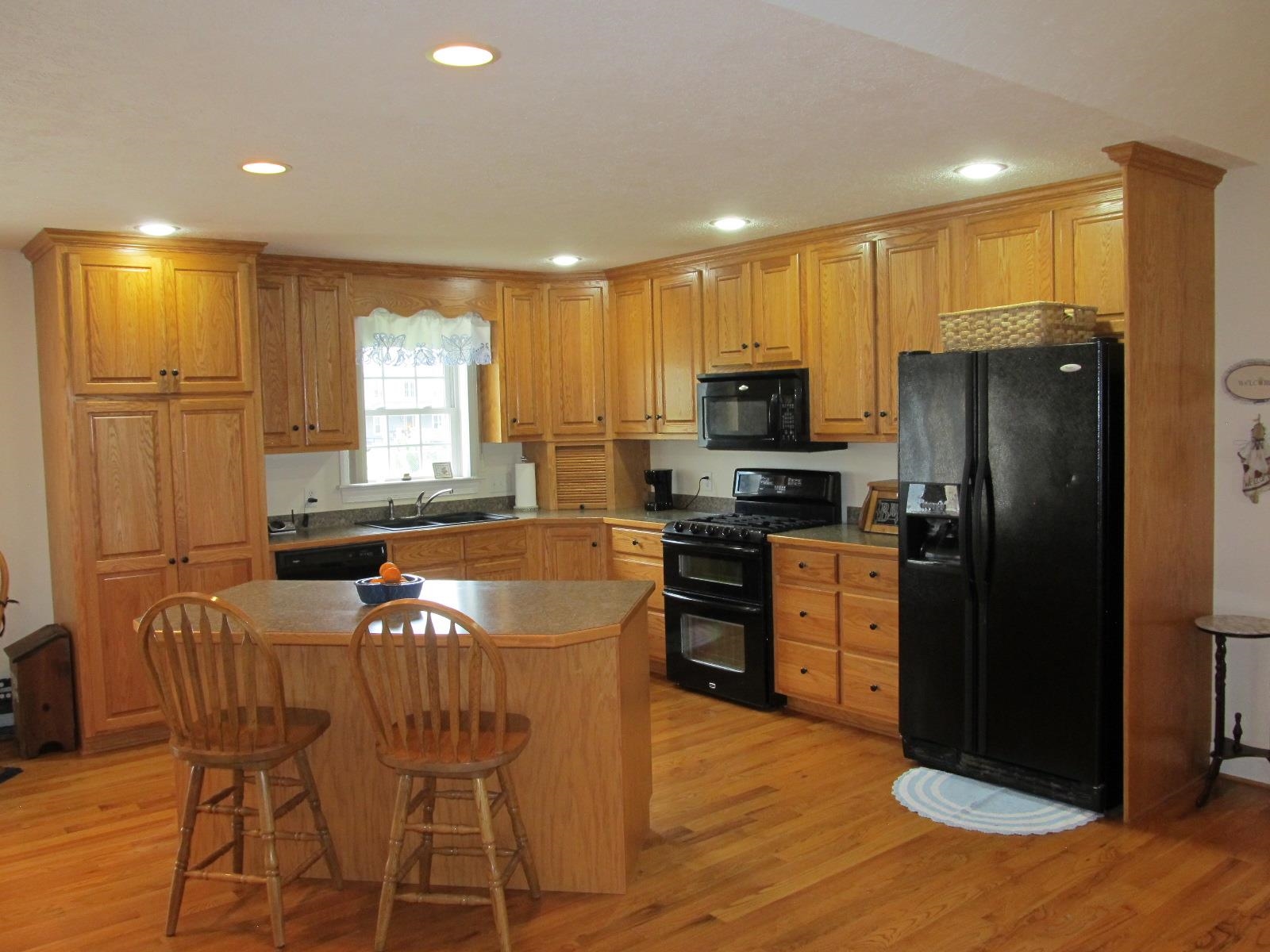 458 St James Road Fishersville, VA 22939 - Photo 8 of 61 a kitchen with granite countertop a refrigerator and a stove top oven