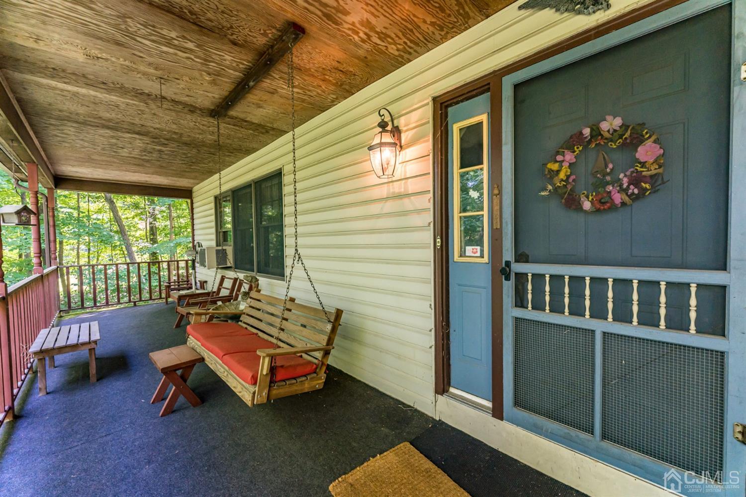19 Russling Road Hackettstown, NJ 07840 - Photo 2 of 27 a reading room with furniture and a large window