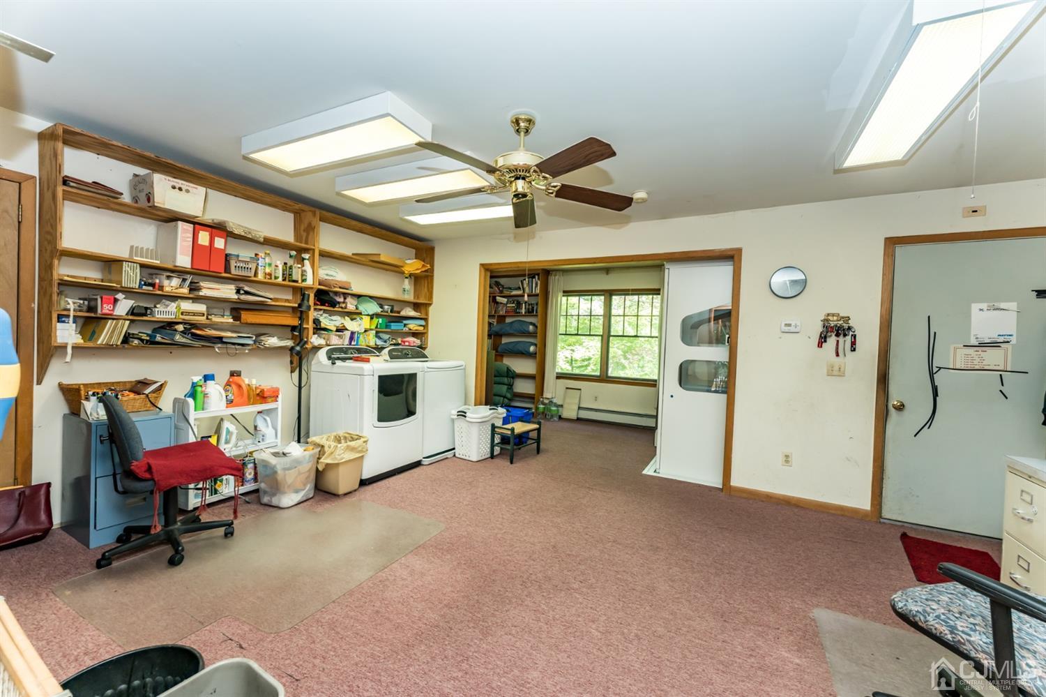 19 Russling Road Hackettstown, NJ 07840 - Photo 11 of 27 a view of a room with workspace and a window