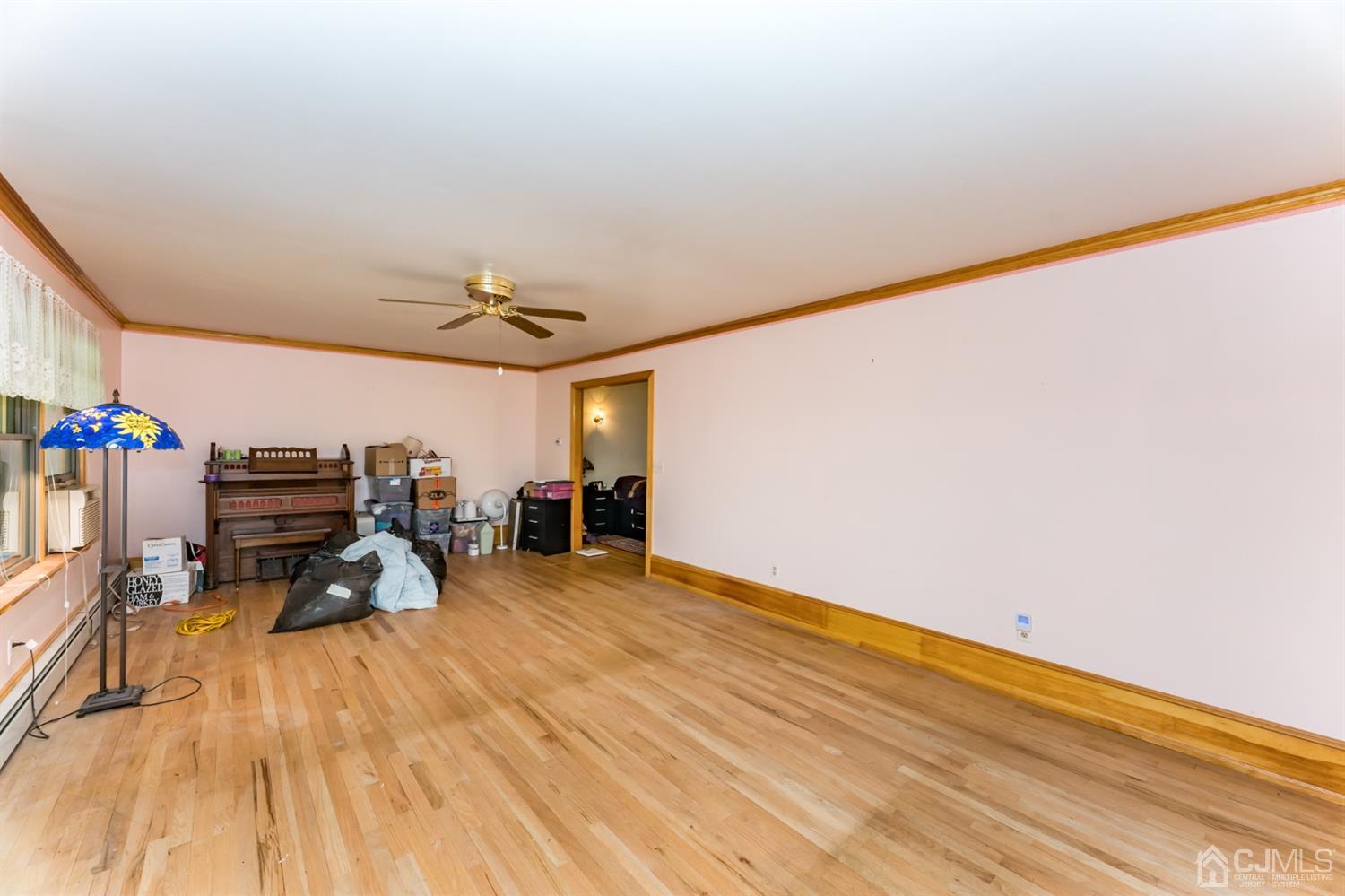 19 Russling Road Hackettstown, NJ 07840 - Photo 4 of 27 a view of a room with wooden floor