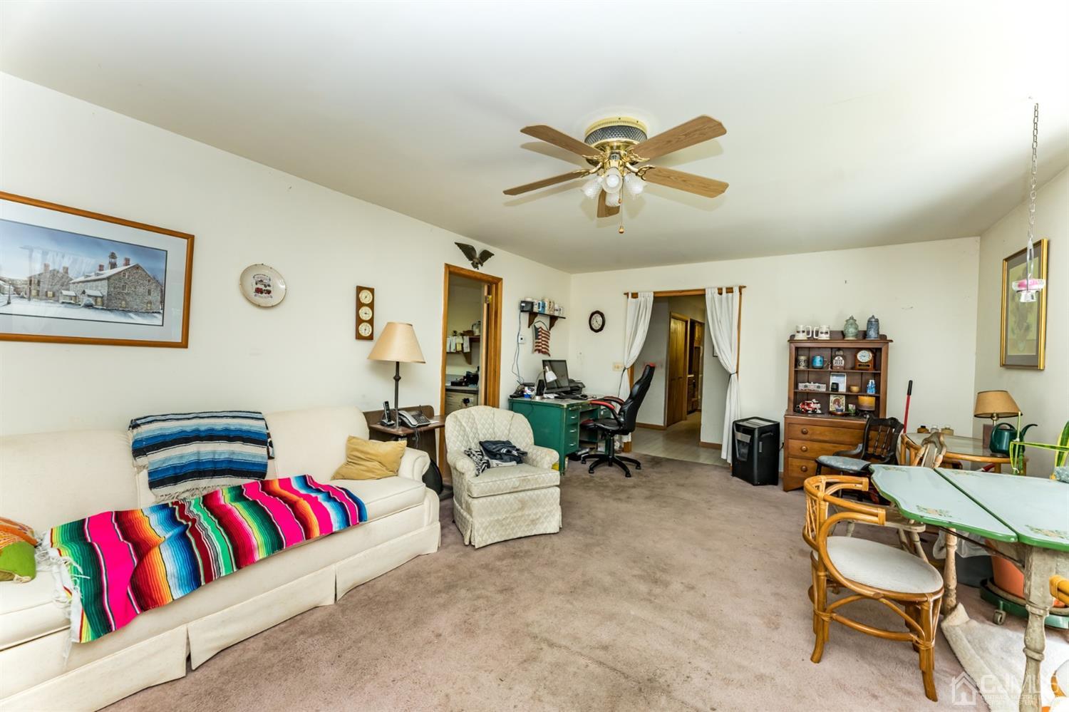 19 Russling Road Hackettstown, NJ 07840 - Photo 10 of 27 a living room with furniture