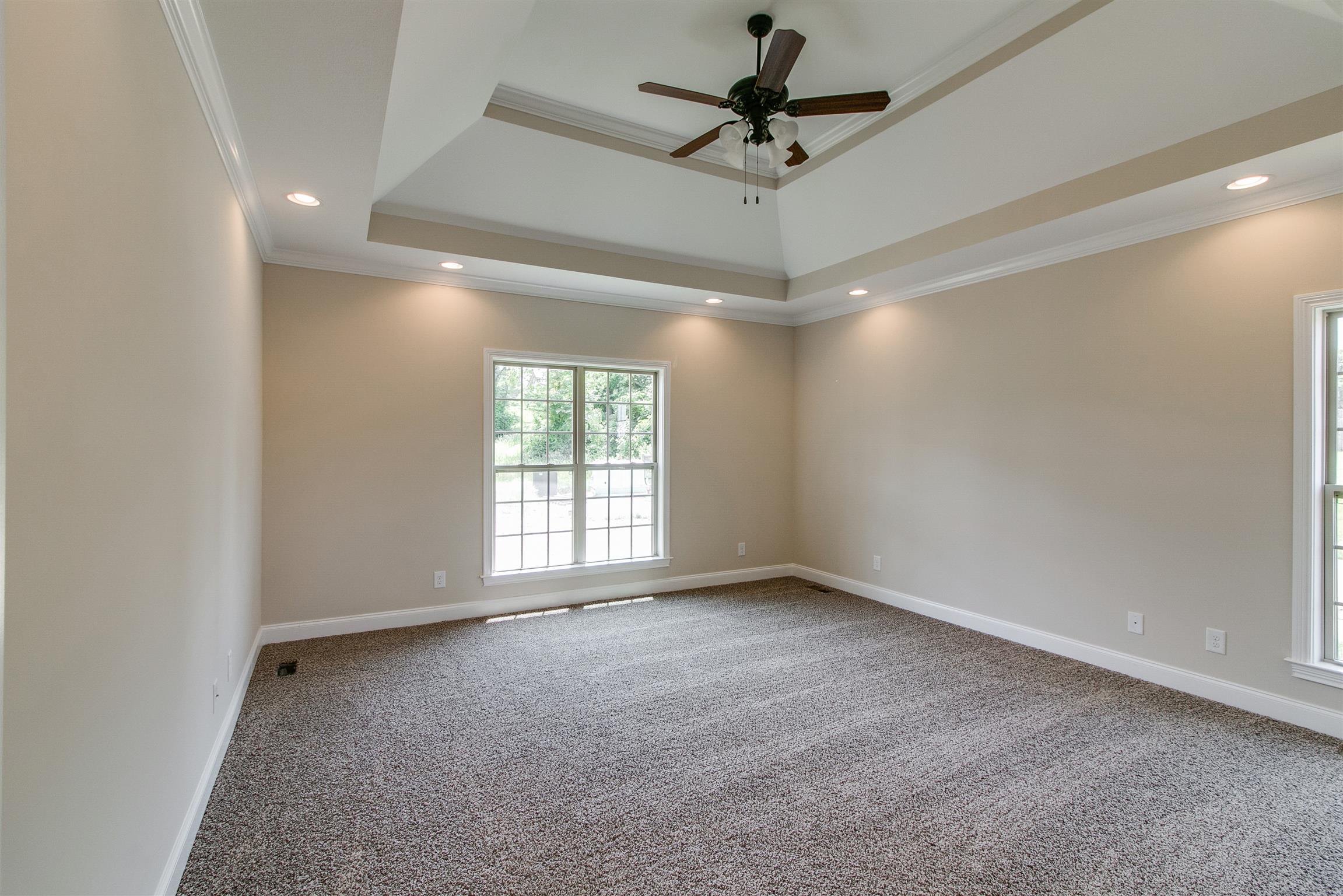 3548 Drake Road Adams, TN 37010 - Photo 17 of 30 an empty room with a ceiling fan and a window
