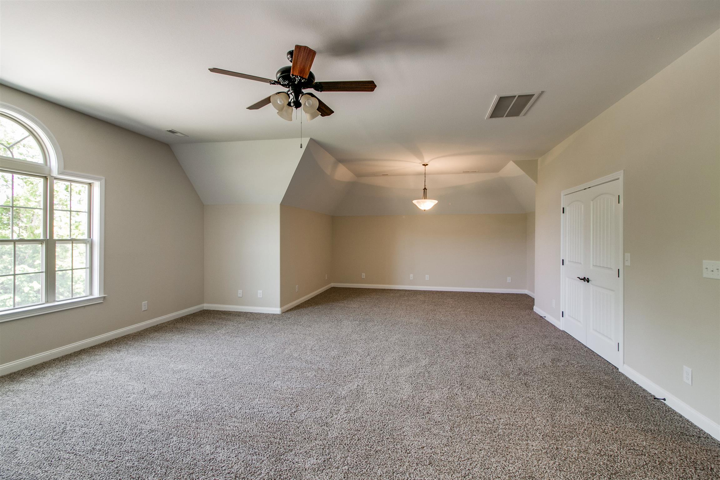 3548 Drake Road Adams, TN 37010 - Photo 23 of 30 a view of a livingroom with a ceiling fan and window