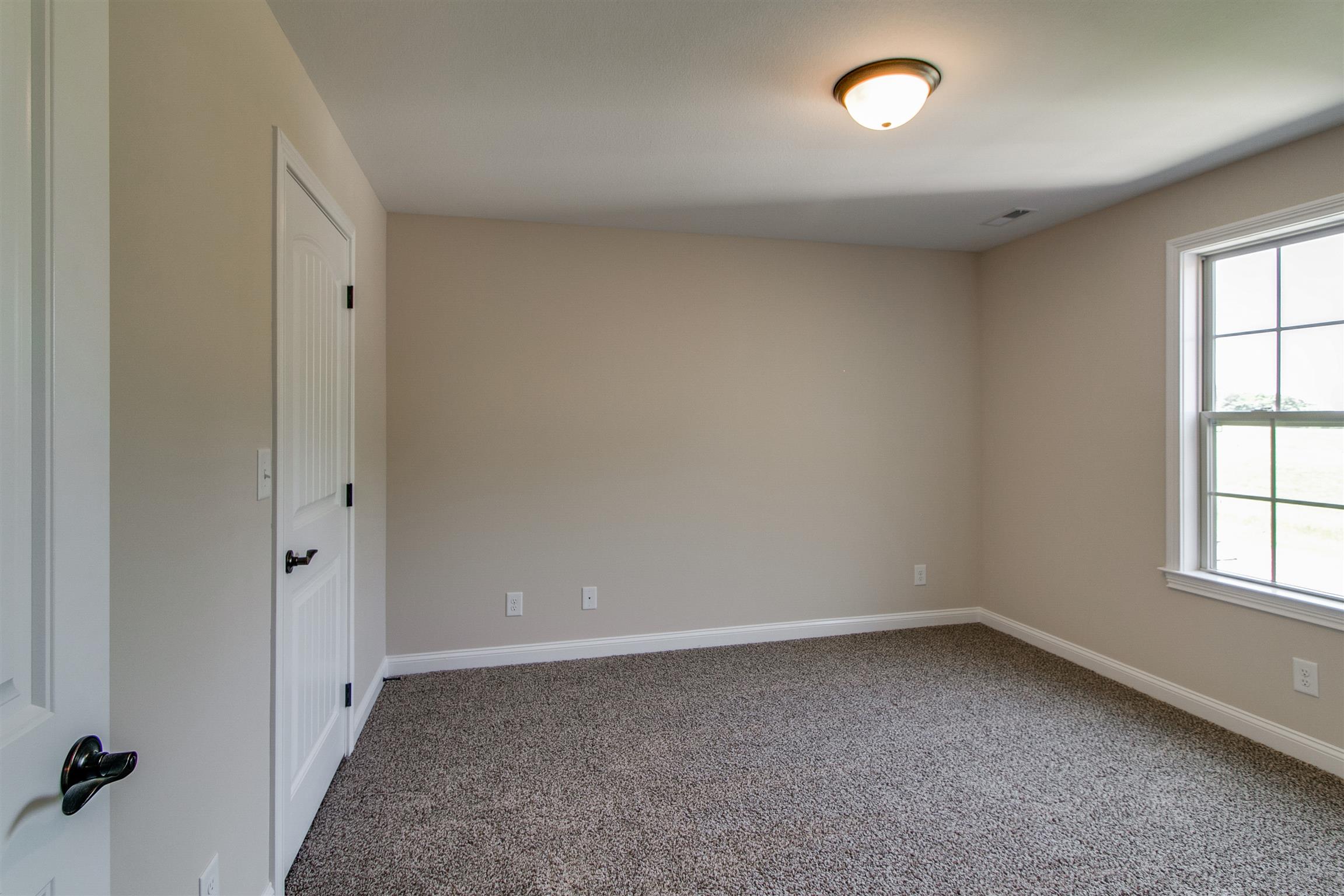 3548 Drake Road Adams, TN 37010 - Photo 27 of 30 an empty room with a window