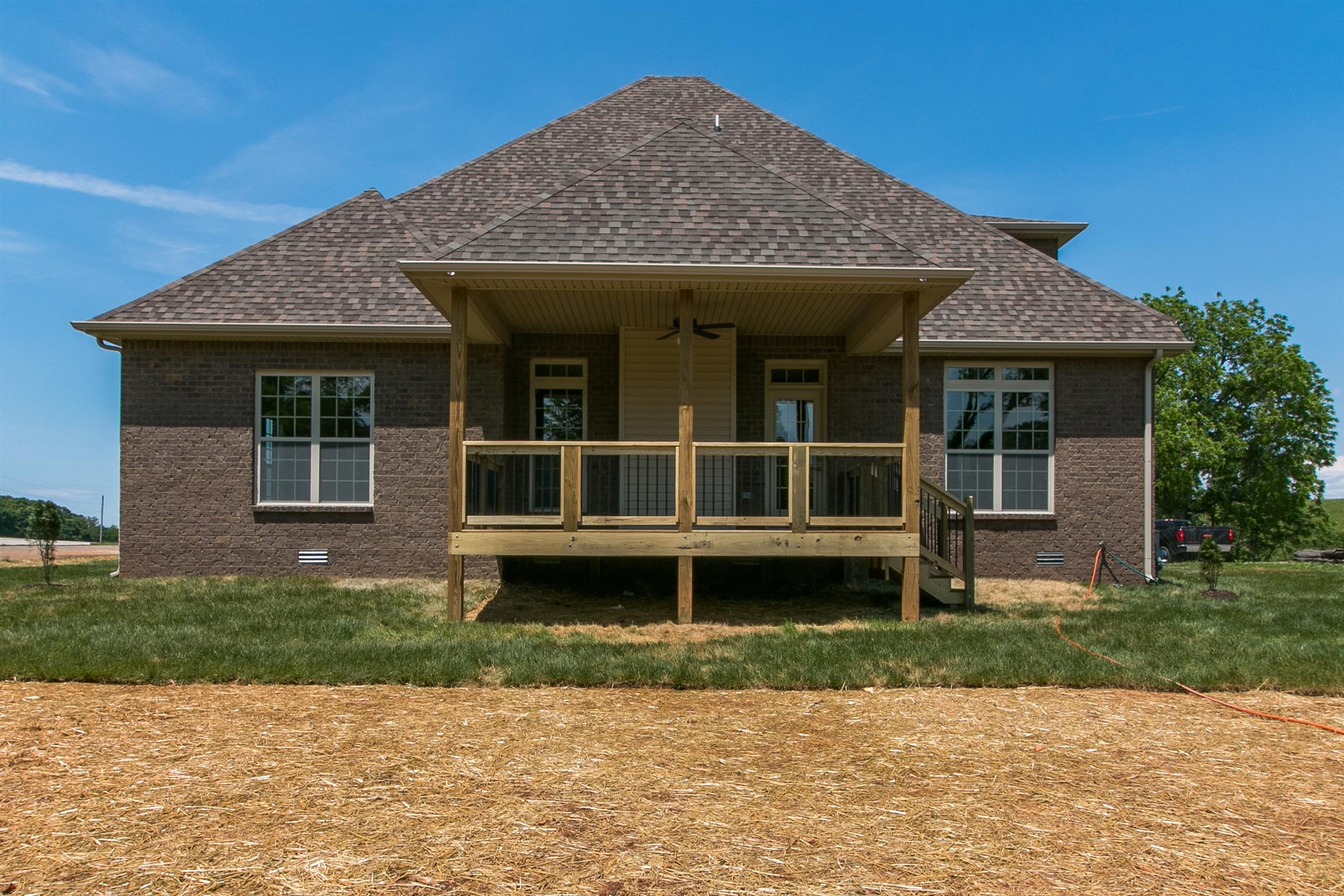 3548 Drake Road Adams, TN 37010 - Photo 30 of 30 a front view of a house with a garden