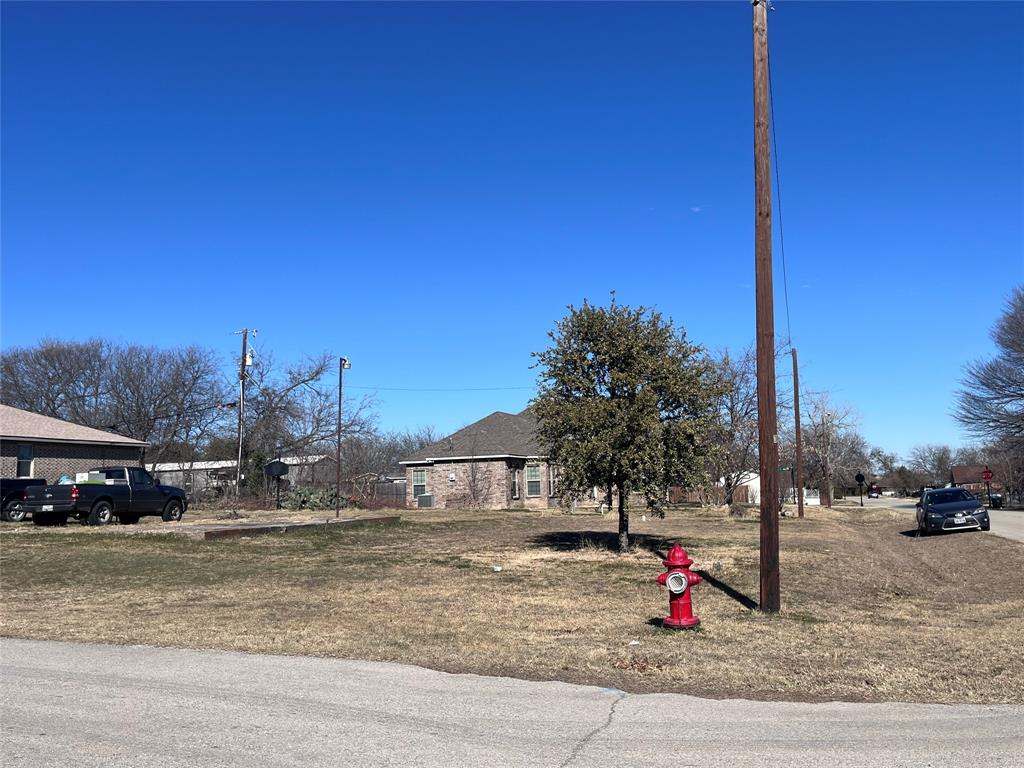 154 Lakeview Road Roanoke, TX 76262 - Photo 2 of 4 a view of road with card parked on road