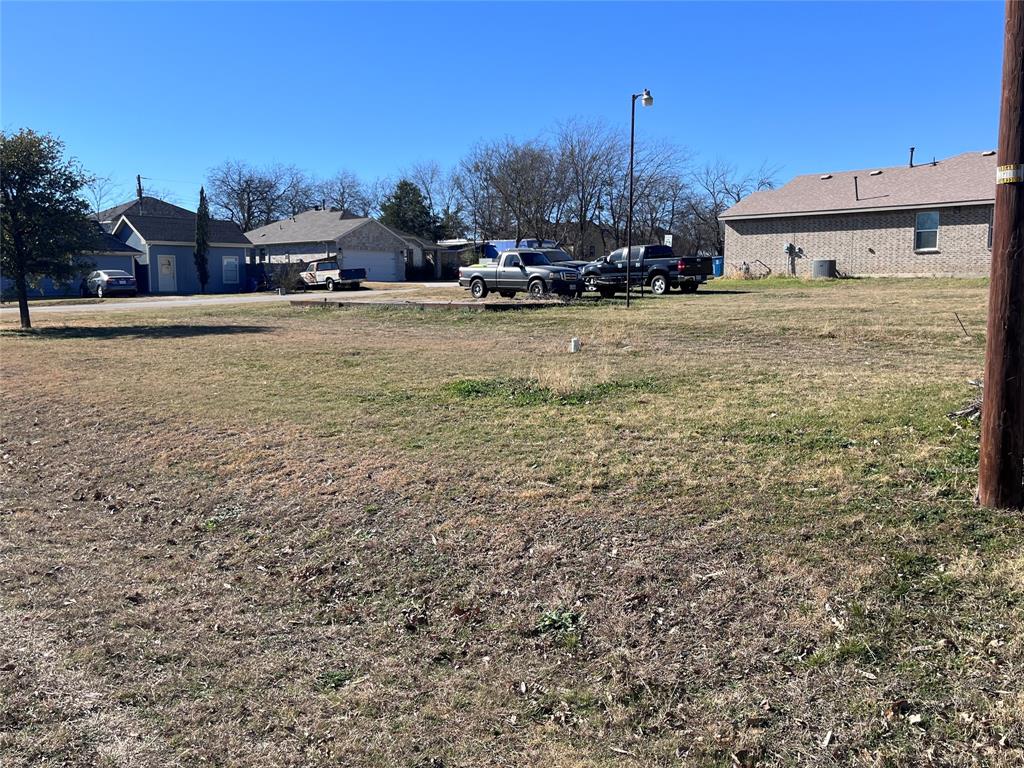 154 Lakeview Road Roanoke, TX 76262 - Photo 4 of 4 a view of a terrace with lawn chairs
