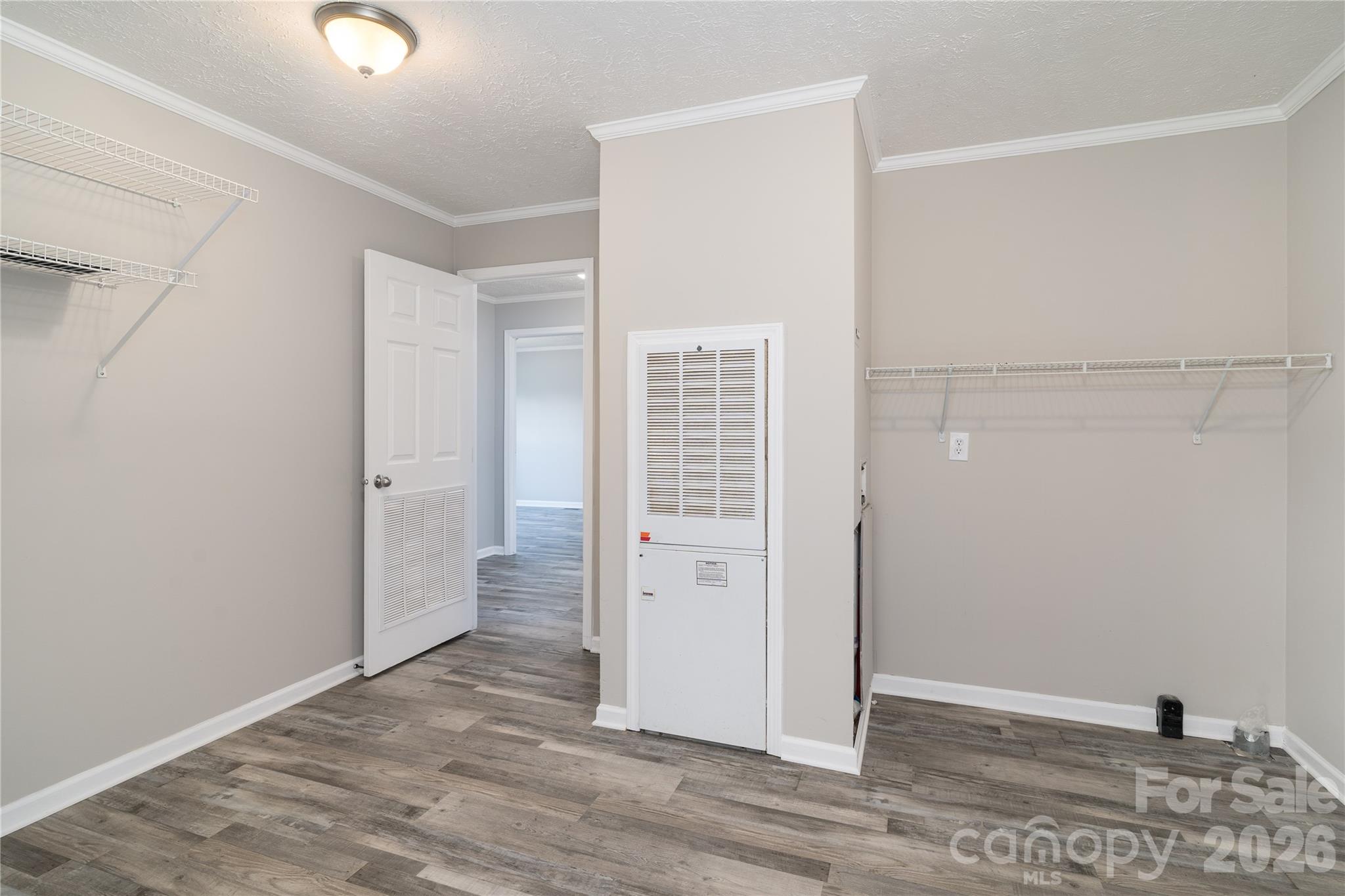 922 Lavender Road Grover, NC 28073 - Photo 30 of 43 an empty room with wooden floor and windows