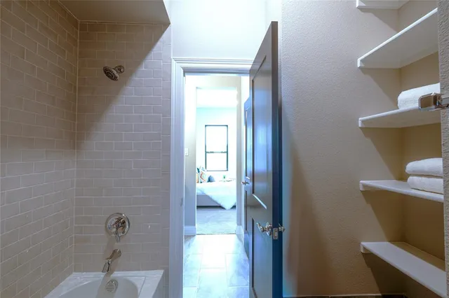 a bathroom with a toilet and a sink
