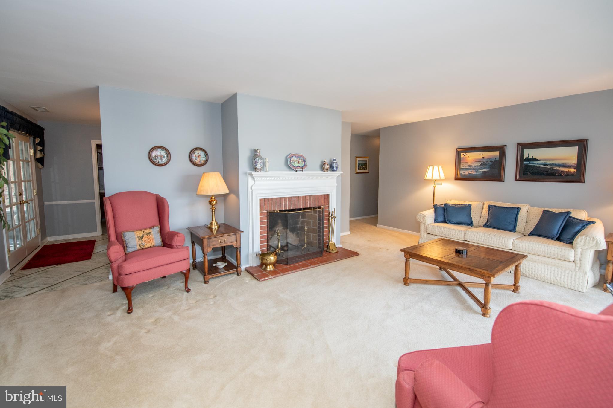 8810 Tyson Road Glenside, PA 19038 - Photo 13 of 53 a living room with furniture and a fireplace