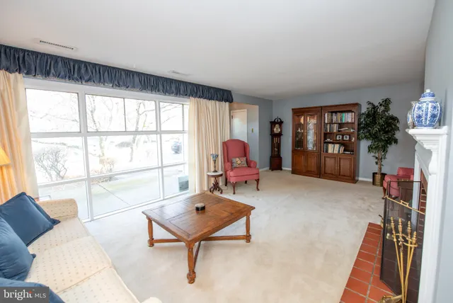 a bedroom with bed and window